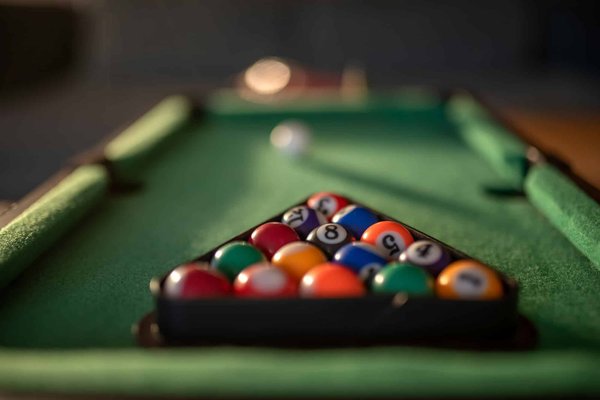 How Do Pro Billiards Players Train for Precision and Control in Break Shots?